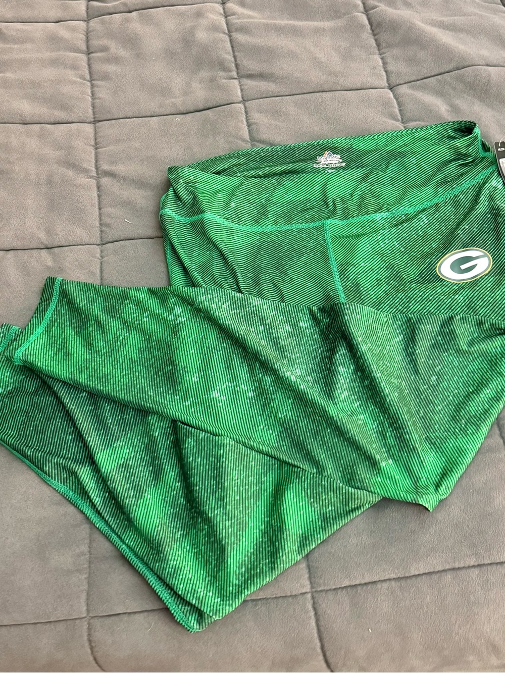 Women’s Green Bay Packers leggings size L. NWT